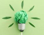 lightbulb made of screwed up green paper