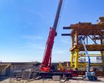 cranes on Weston Seafront working on the See Monster installation