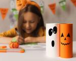 Young girl making Halloween crafts