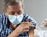An older person getting a vaccine