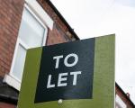 A To let sign on a house