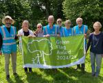 Volunteers of Trendlewood Park, Nailsea, with the Green Flag