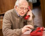 a pensioner making a telephone call