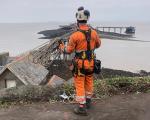 A man in high vis at Birnbeck Pier