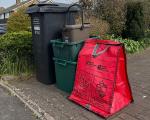 black bin, recycling box and red bag