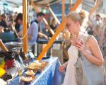 woman looking at a market stall