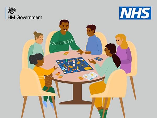 cartoon of six people sat round a table with the NHS and government logos in the top corners