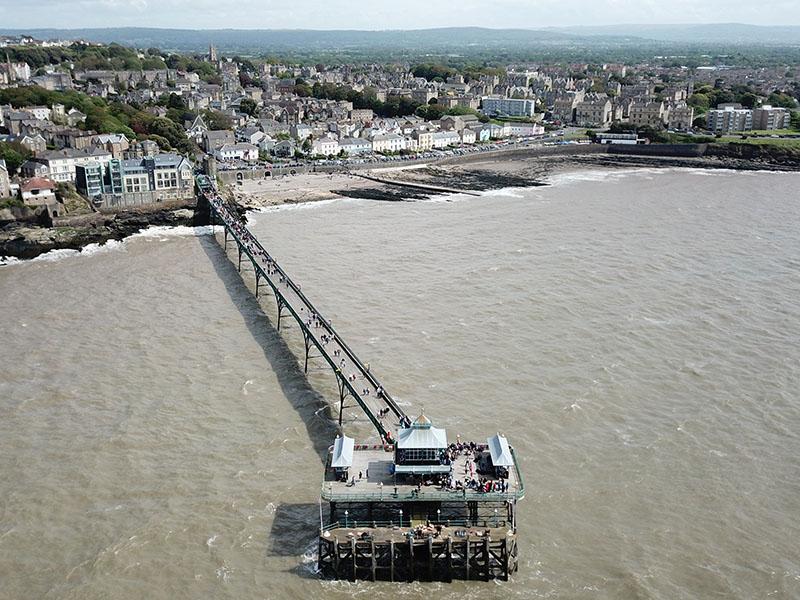 aerial shot of Clevedon pier while the tide is in