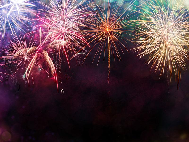 brightly coloured fireworks on a dark background