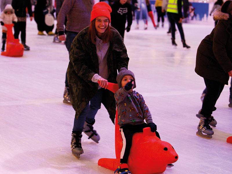Young family ice skating. Photo courtesy of Icescape