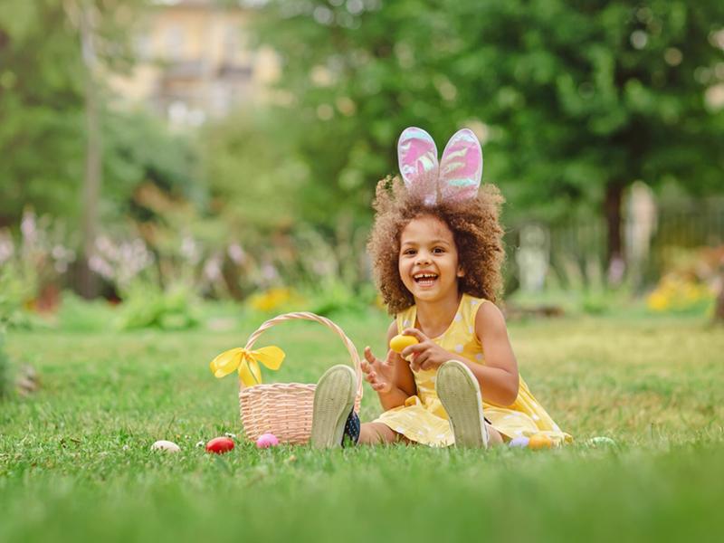 A child dressed in Easter costume