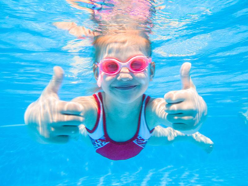 a child swimming underwater