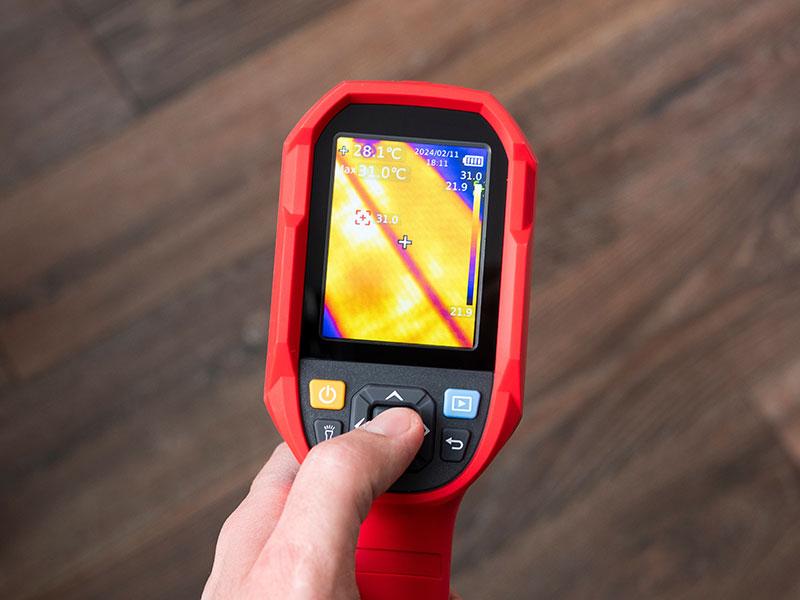 A hand-held heat detection camera