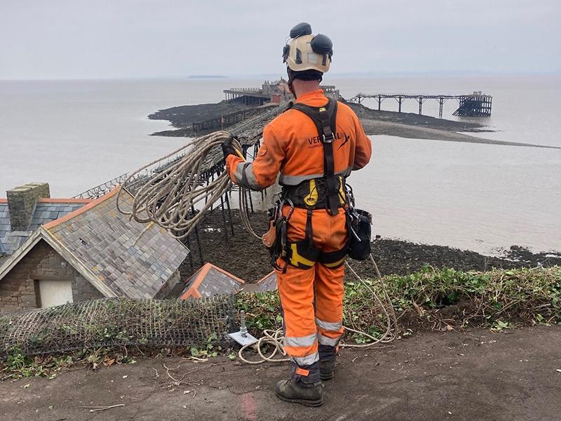 A man in high vis at Birnbeck Pier