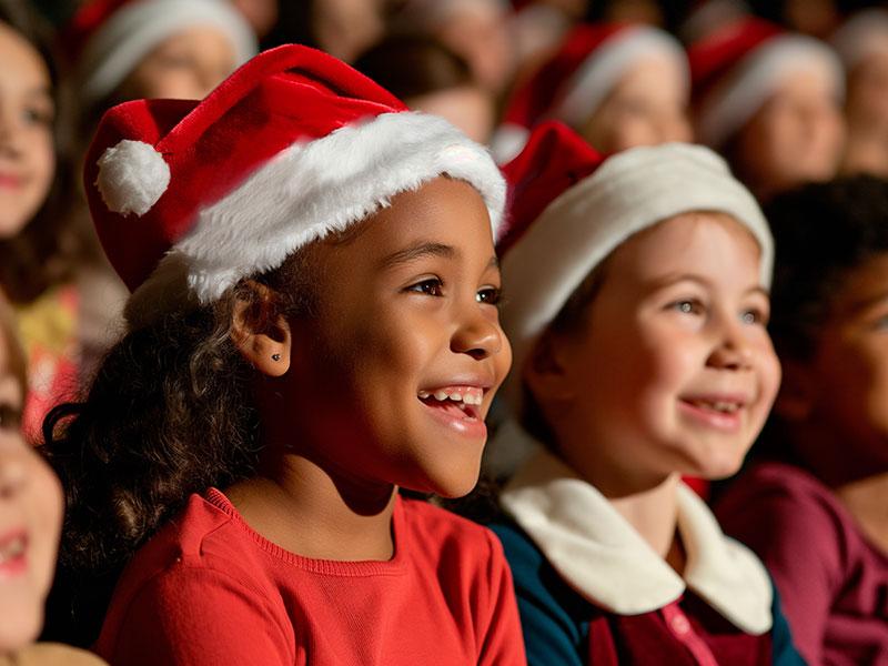 children enjoying a Christmas theatre show