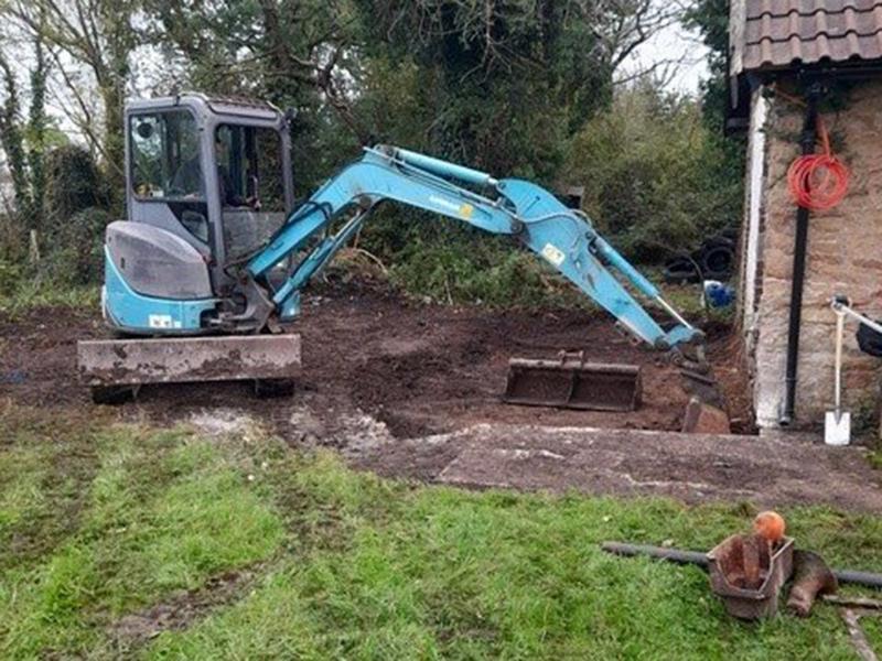 a digger on a farm
