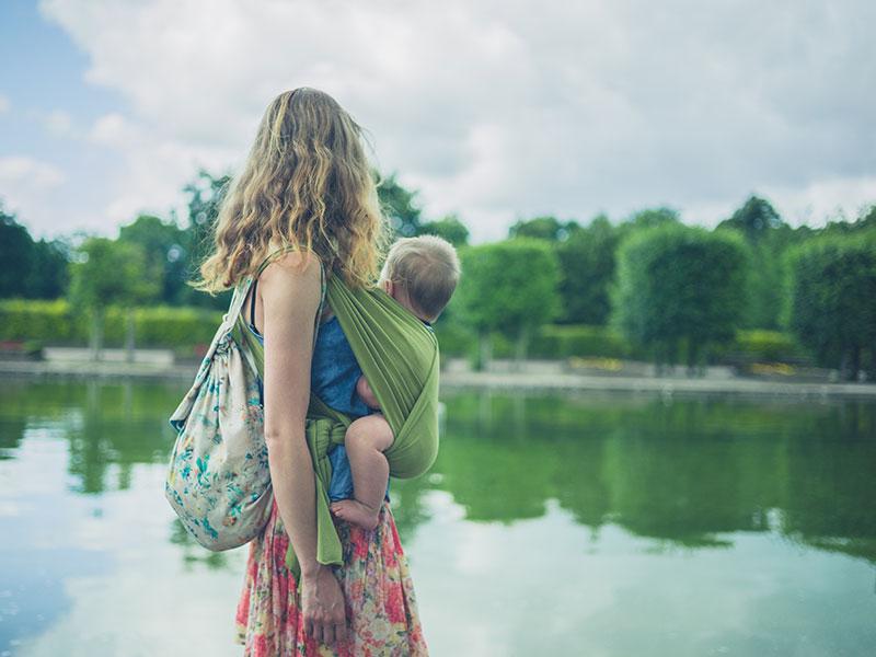 Woman with baby in a sling