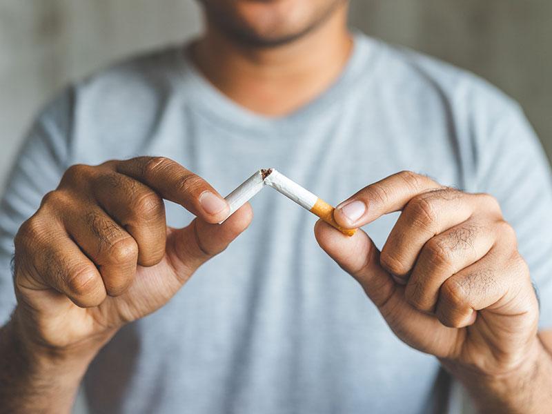 This image shows a photo of someone stopping smoking