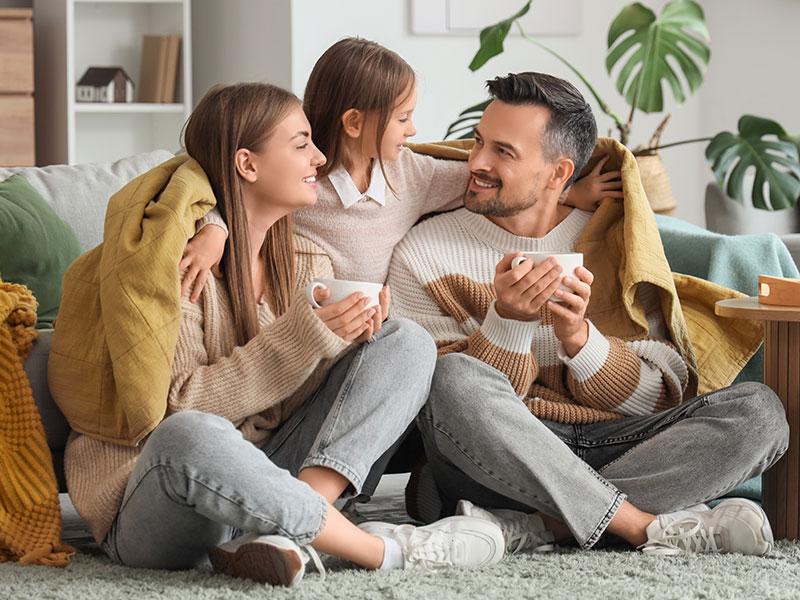 This shows a family staying warm inside