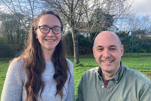 man and woman smiling