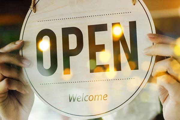 an open shop sign