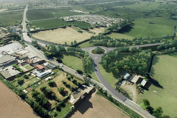 An overhead aerial shot of the area where we will be building the Banwell Bypass - green fields with a road and houses