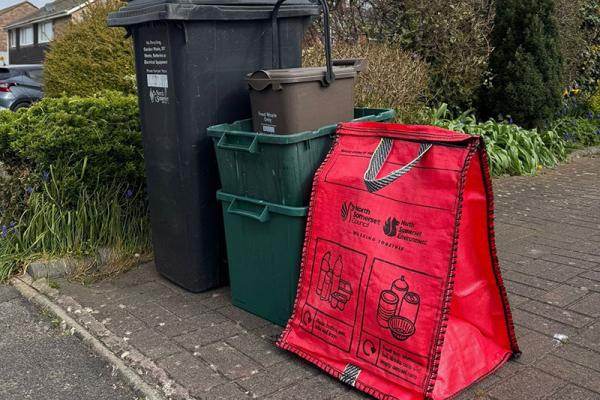 black bin, recycling box and red bag