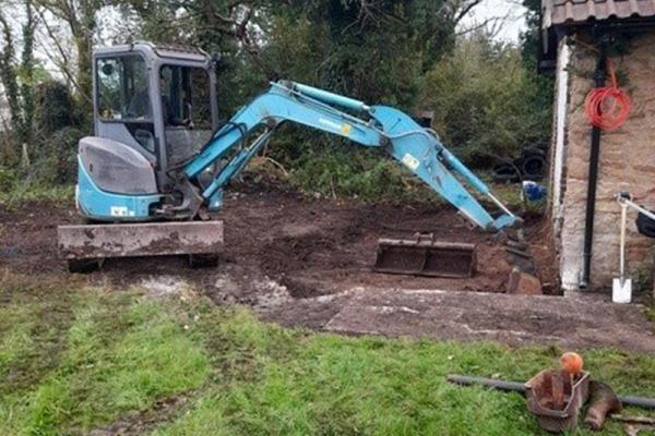 a digger on a farm