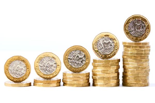 This shows pound coins in a stack