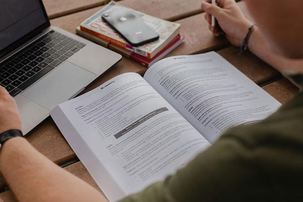 This shows someone looking at a book
