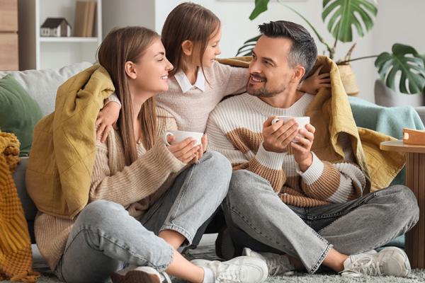 This shows a family staying warm inside