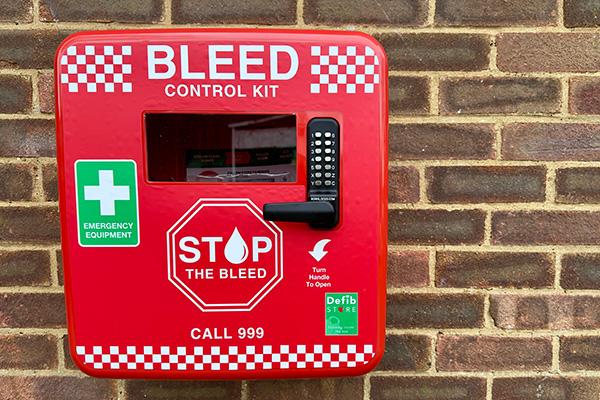 bleed kit mounted on wall